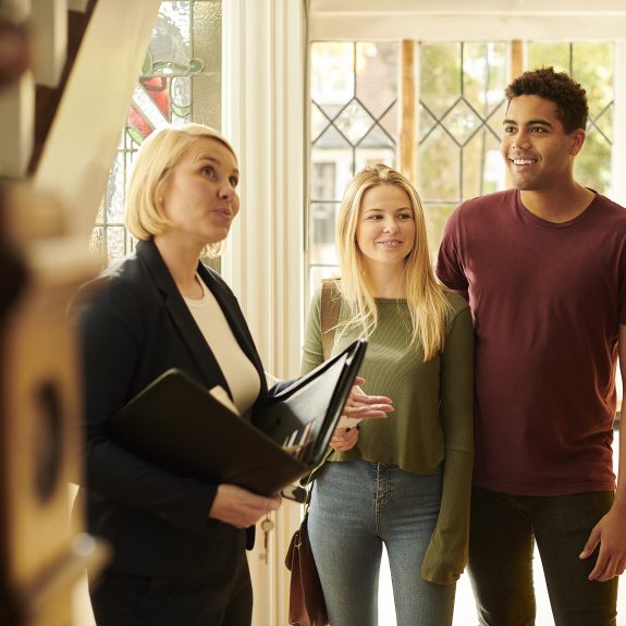 estate agent showing a home
