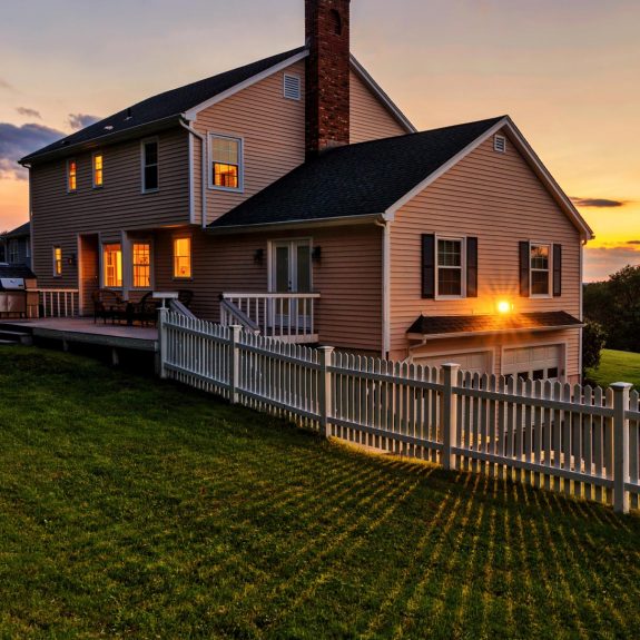 Beautiful colonial American house at sunset